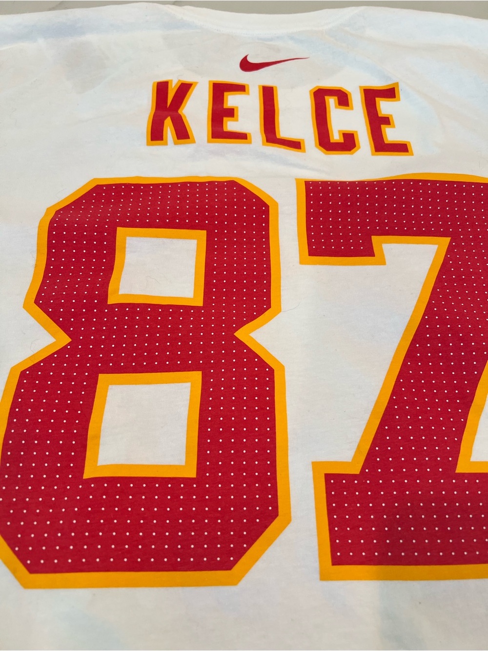 Travis Kelce Nike White Tee with Red & Gold Chiefs 87 Graphic